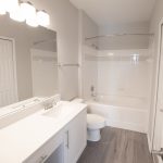 Apartment Bathroom Renovations After Photo - White Bathroom